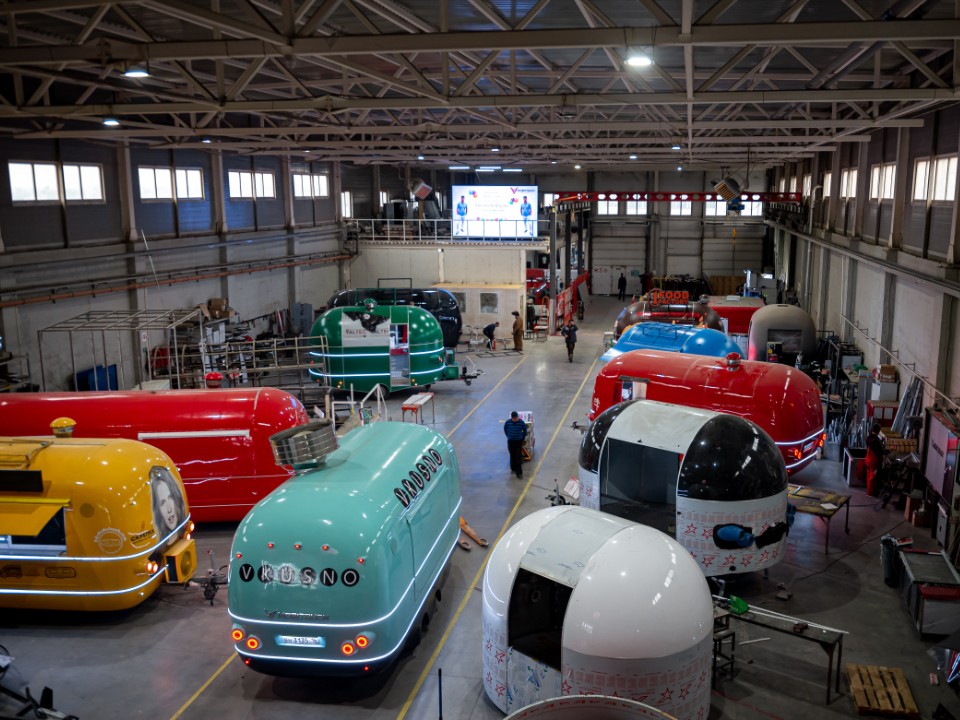 MOBITRUCK commercial shells at different production stages inside the manufacturing facility
