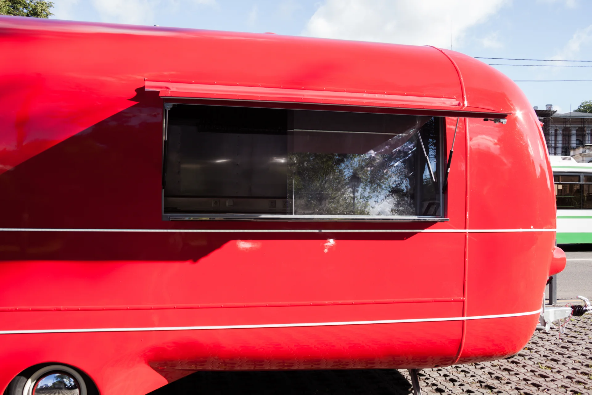 Large open service window on the red MobiEdge 8 trailer