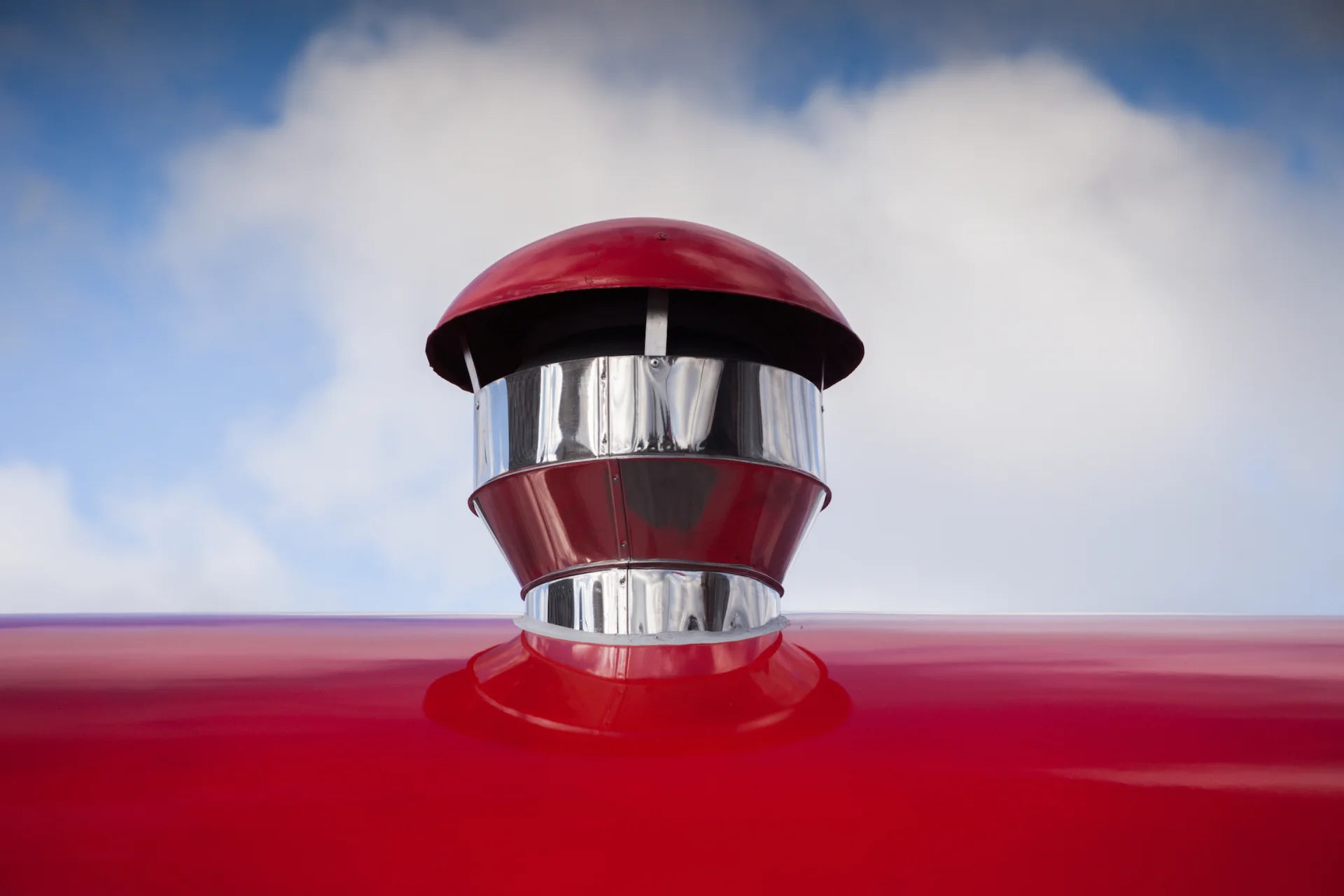 Close view of a capped stainless ventilation outlet on the MobiEdge 8 roof