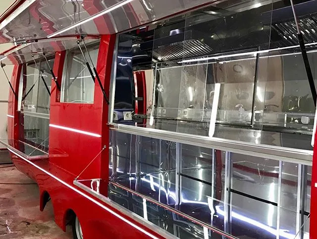 Open red MobiEdge 8VT service side with illuminated glass display counters