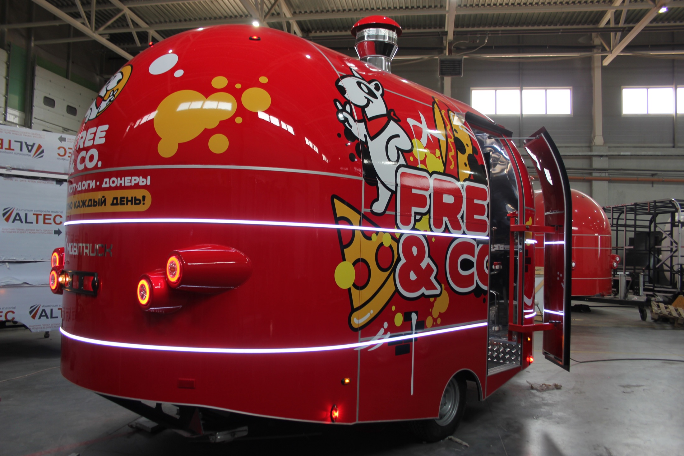 Rear entry door open on the Free and Co. mobile food unit