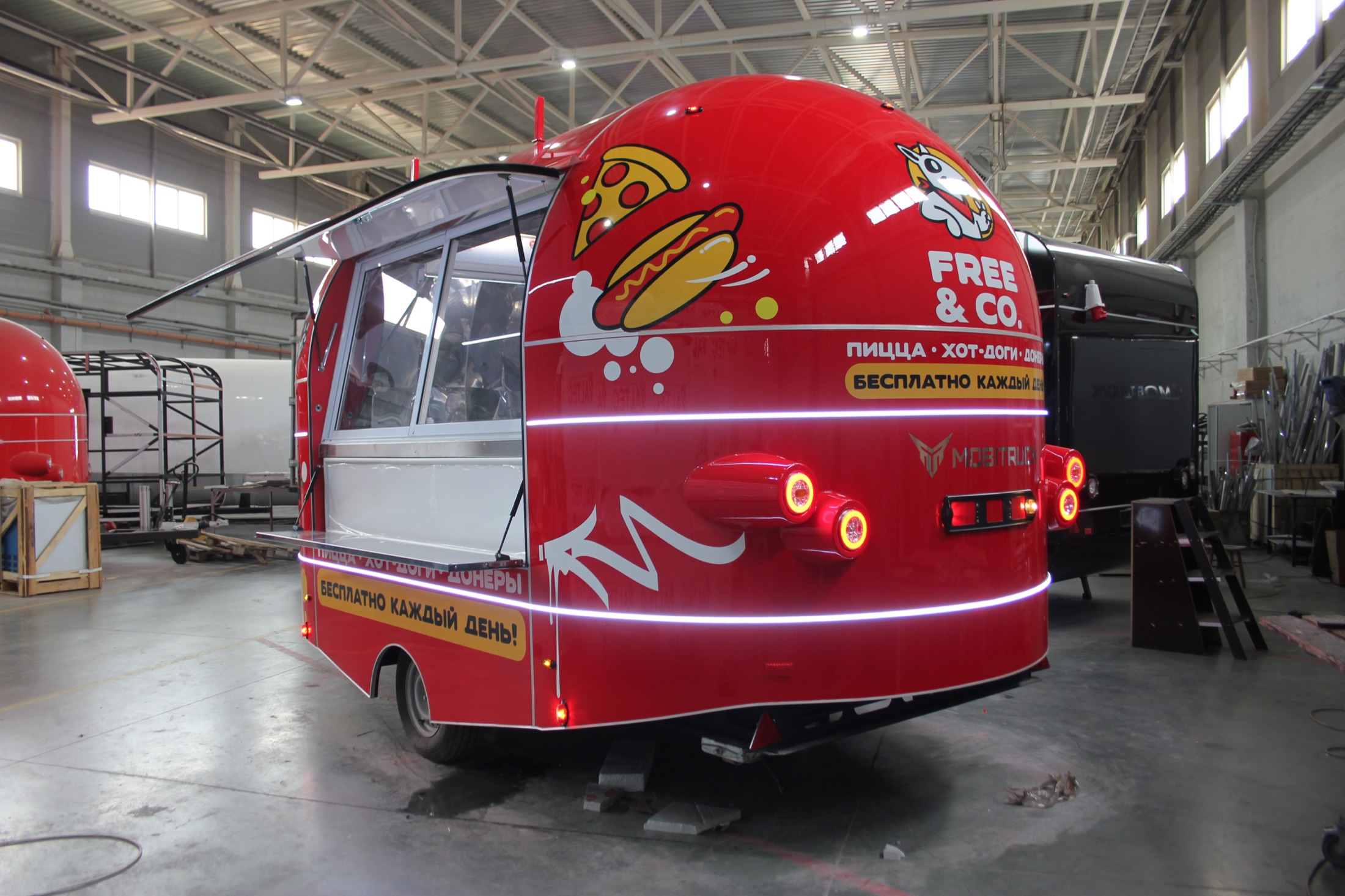 Rear service-side view of the Free and Co. trailer