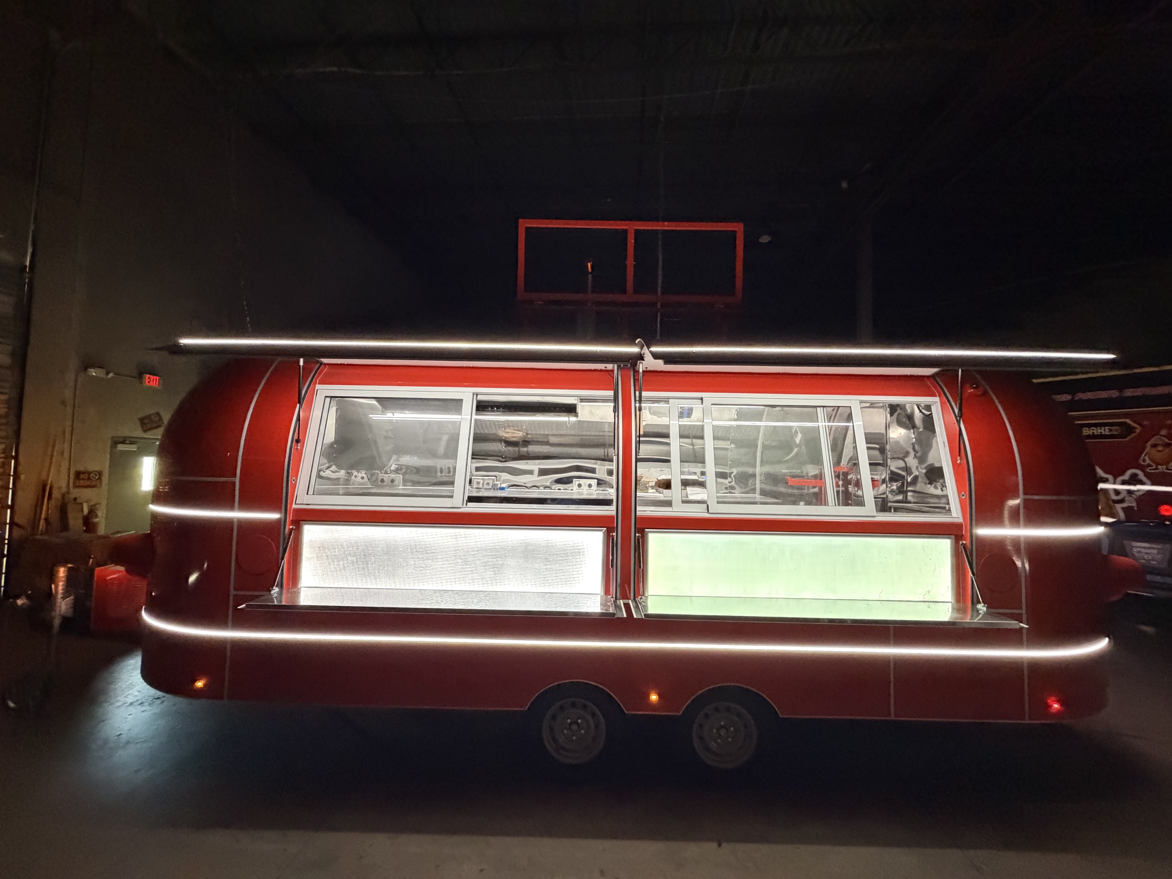 Completed red MobiAir demonstration trailer at the Florida partner facility in Deerfield Beach