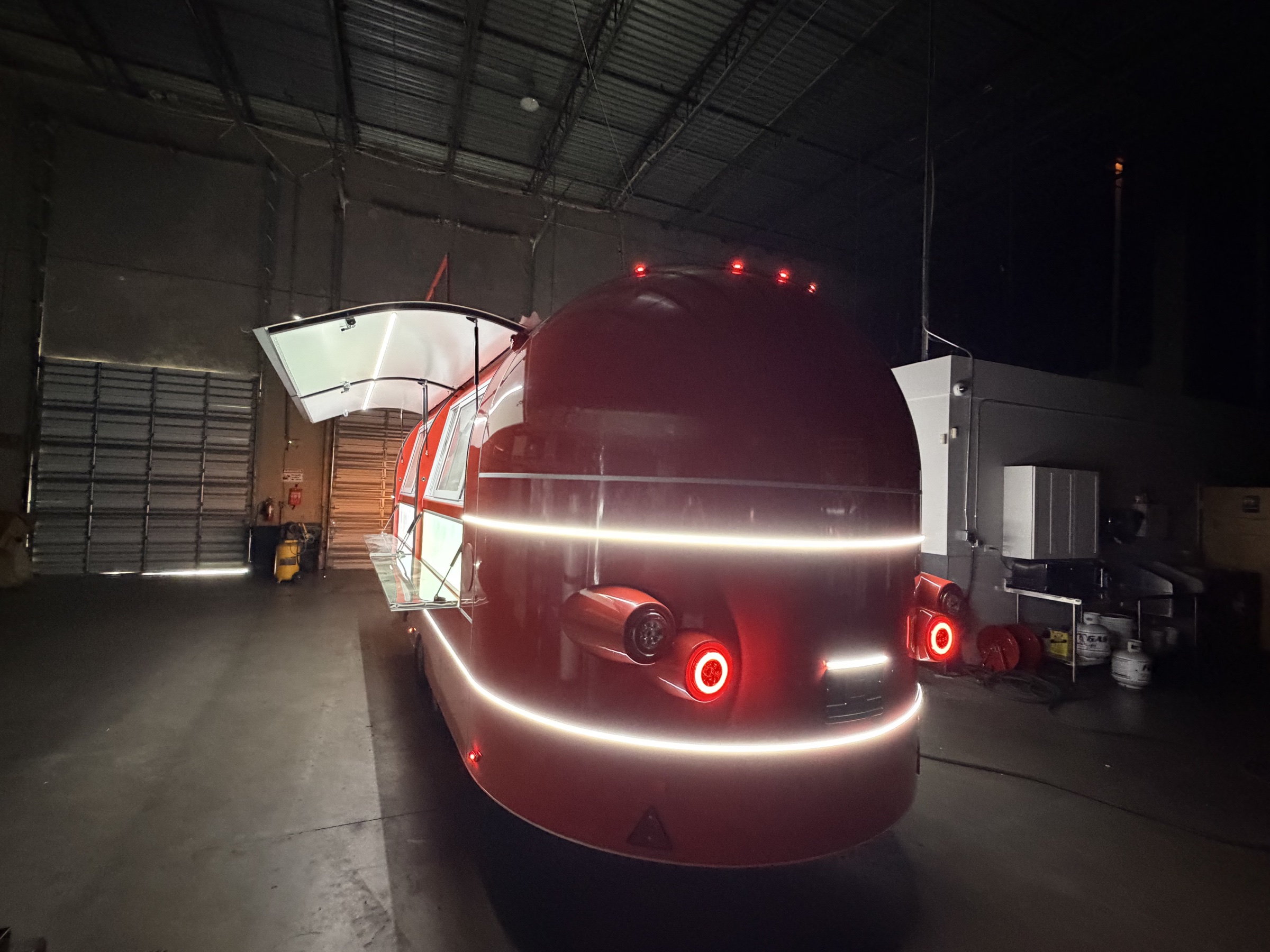 Rear view of the completed red MobiAir demonstration trailer at the Deerfield Beach partner facility