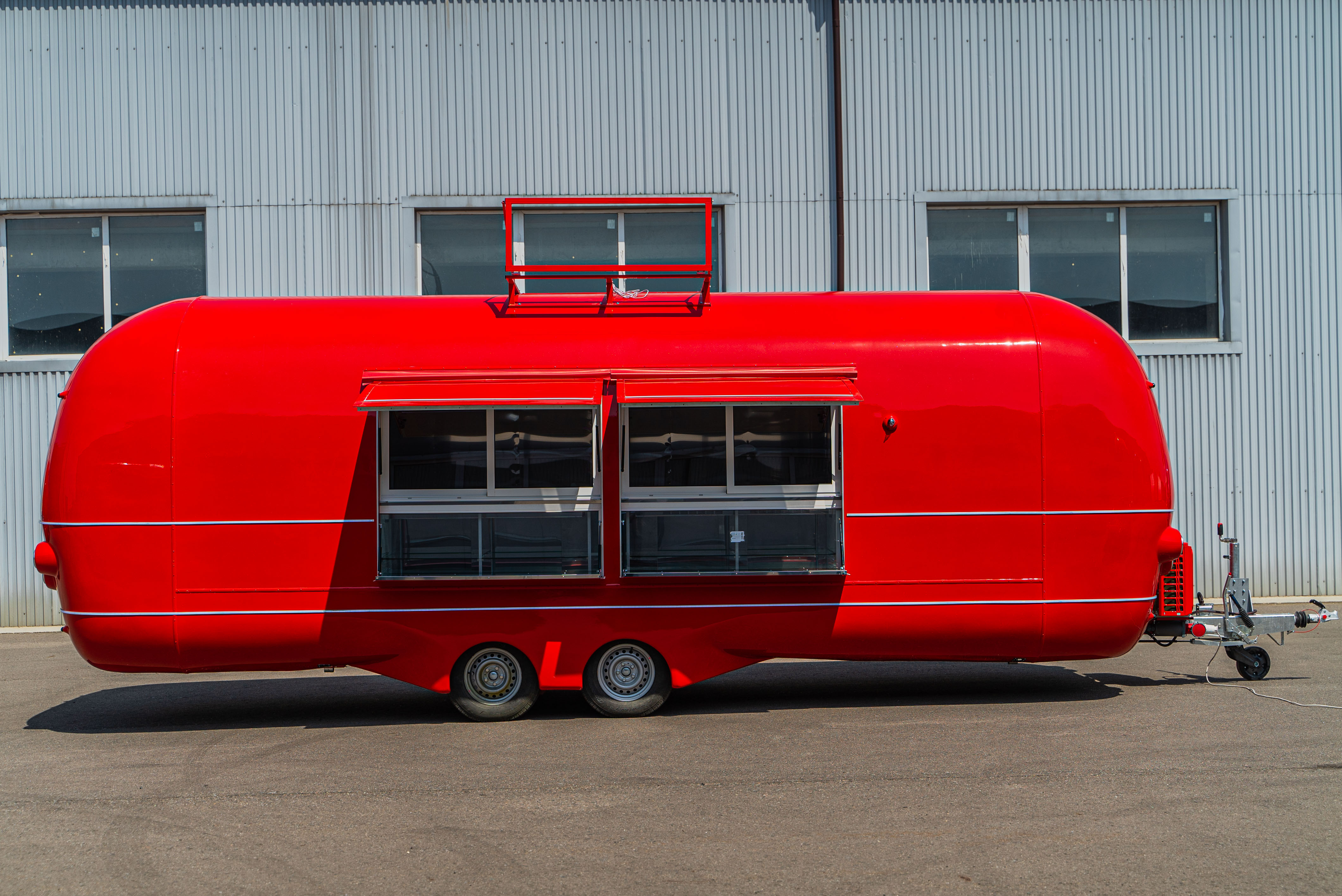 Unbranded red MobiAir food trailer shown from the service side for footprint and access planning