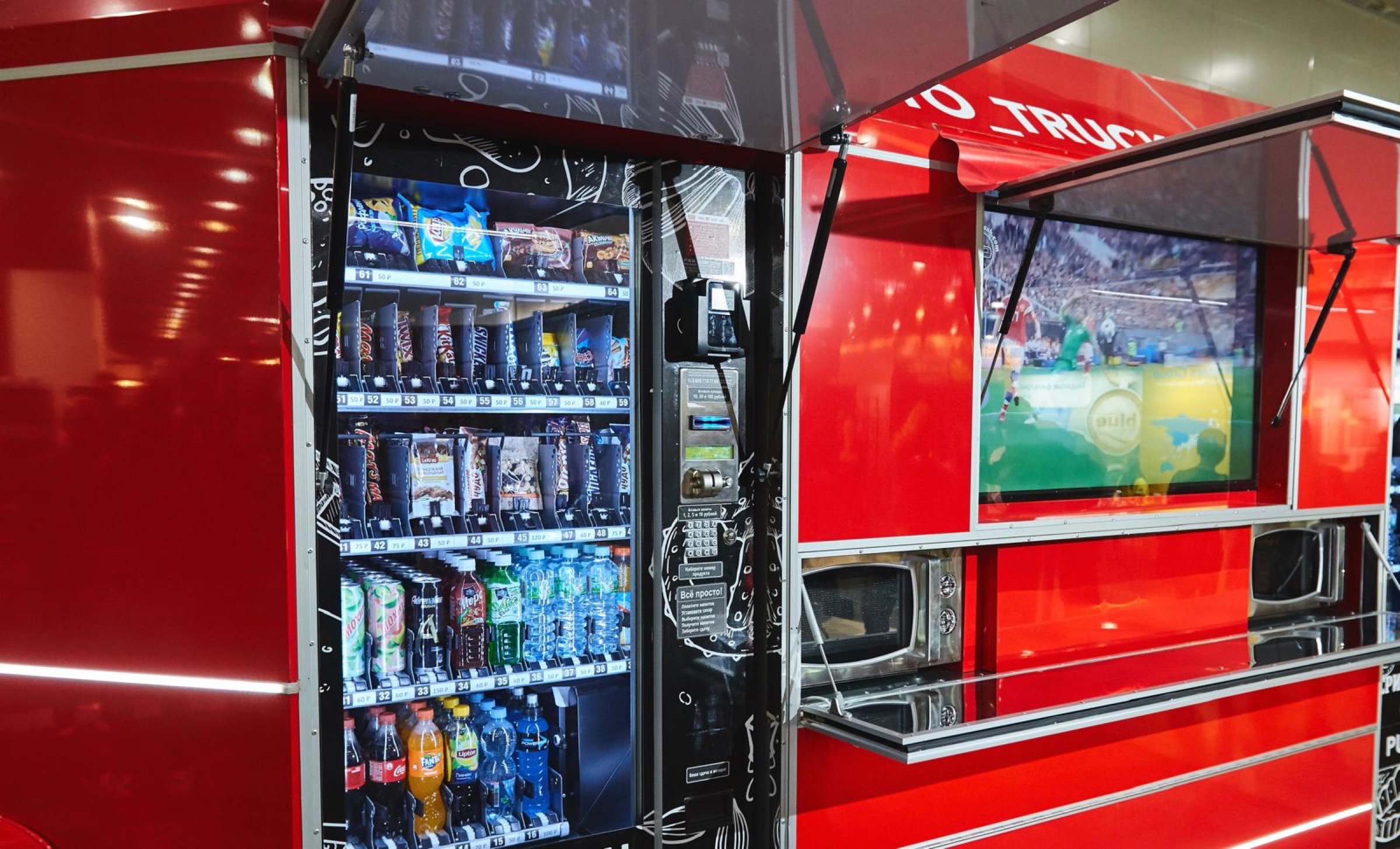 Close view of a stocked vending machine, payment controls and display built into MobiVending